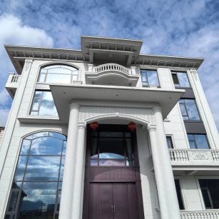 湖州白麻别墅外墙干挂石材效果示例