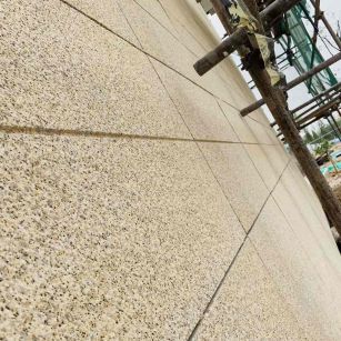 湖州 黄金麻花岗岩荔枝面外墙干挂石材效果示例