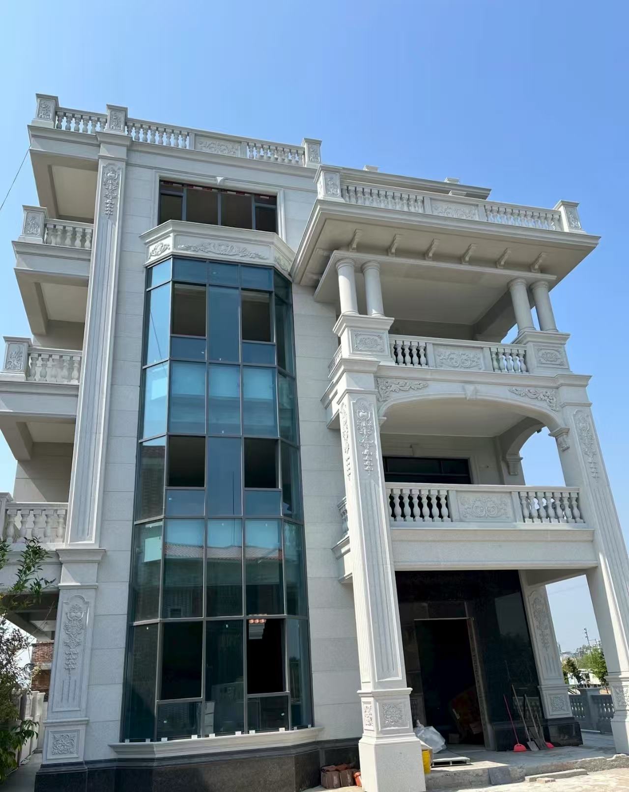 湖州 白麻花岗岩别墅外墙干挂效果展示